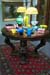 Highly carved center table - Tiffany bronze lamp...