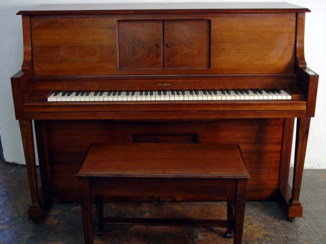 Aeolian player piano with rolls