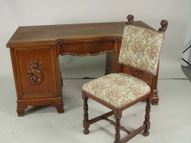 Carved oak desk and chair