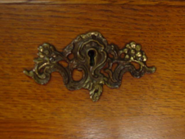 Drop front secretary with claw feet hardware