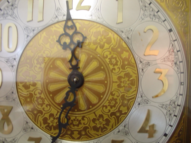 Modern tall clock face detail