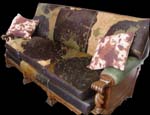 Antique Sofa with cow-hide upholstery