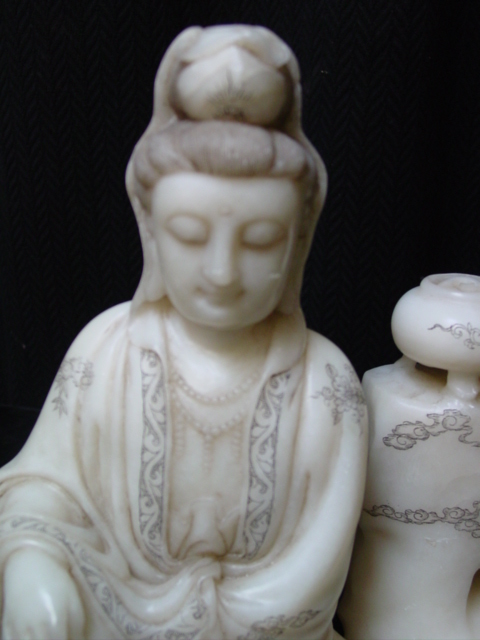 Stone carved Quan Yin   cu