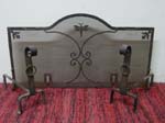 Spanish Colonial wrought iron fire screen and andirons