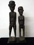 Wood carved tribal statues 25in and 22 in.