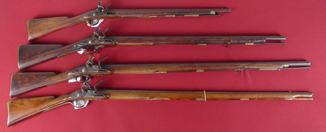 Collection of British Flint lock muskets.