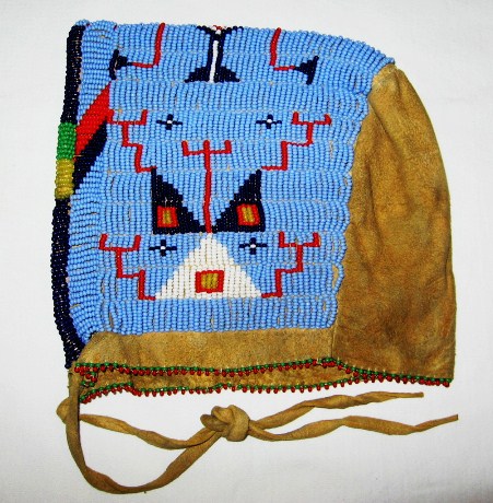 Rare circa 1890's Sioux beaded baby bonnet.