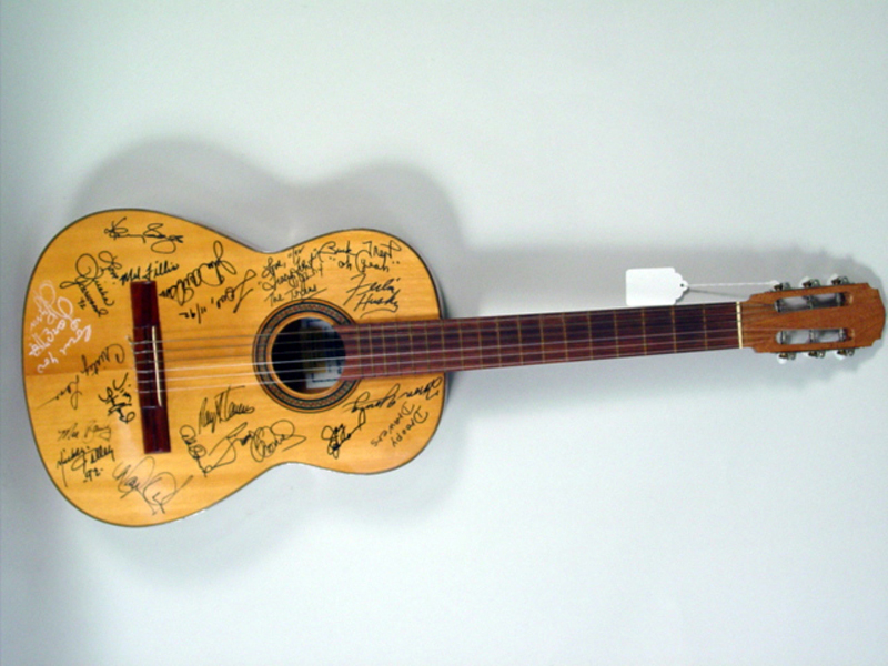 Johnny Cash,June Carter Cash& more signed guitar