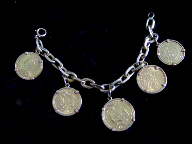 14kt Gold bracelet with 5 antique gold coins