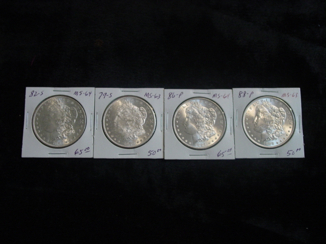 4 Silver Dollars 1879, 1882 ,1883, 1886