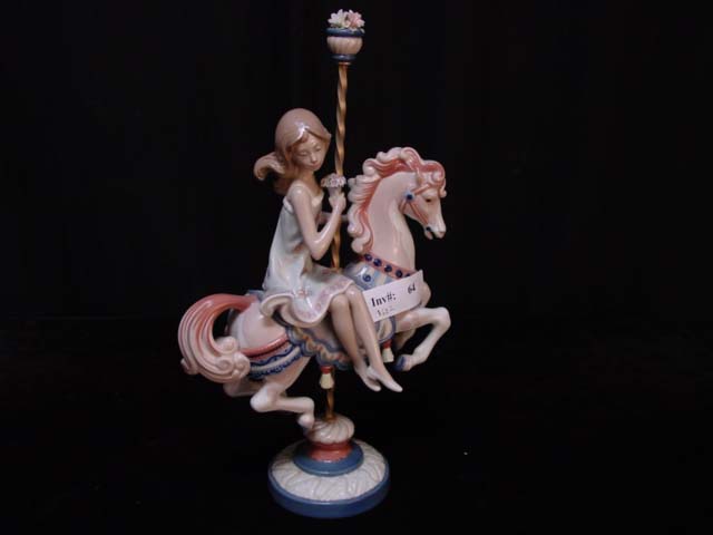 Lladro girl on carousel