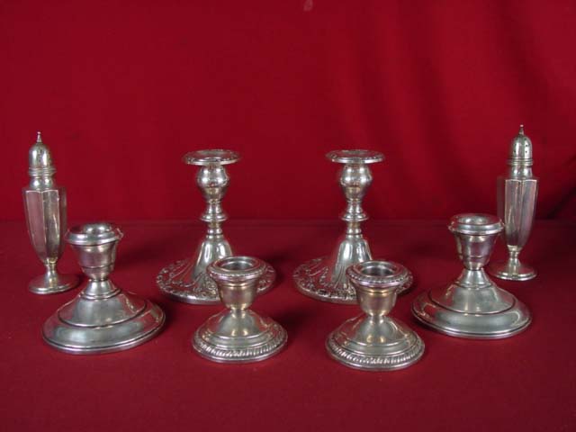 Sterling lot of candle sticks, salt and peppers